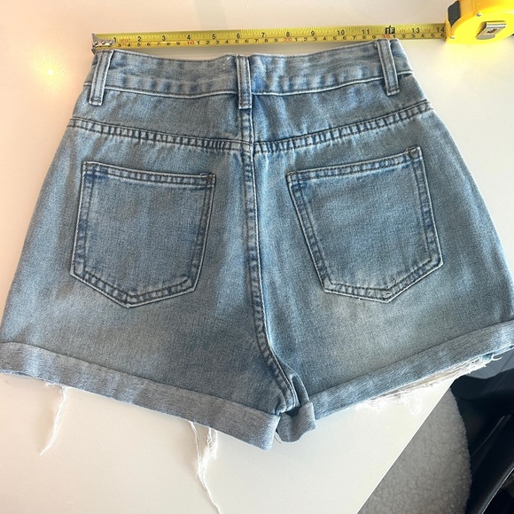 Blue Chanel Denim Jean Shorts with Distressed Hem and Logo Design - Picture 2 of 8